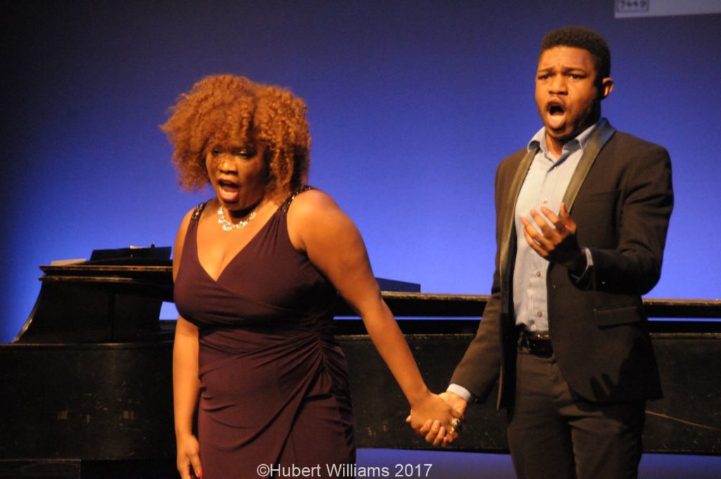 Photo of man and woman singing
